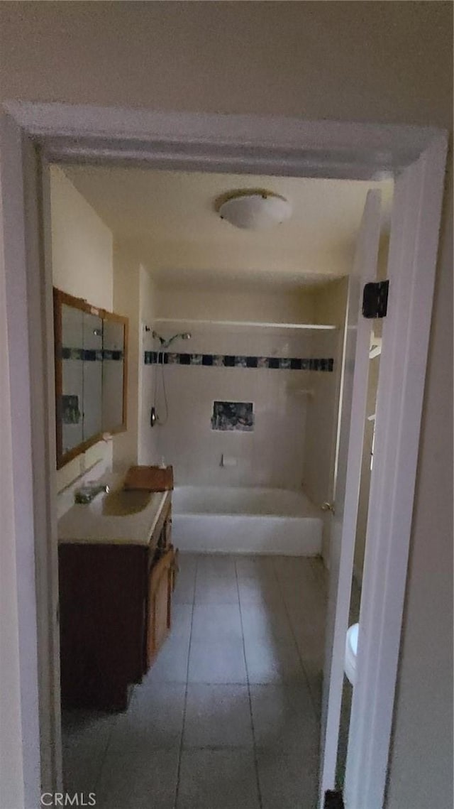 bathroom with vanity and tile patterned floors