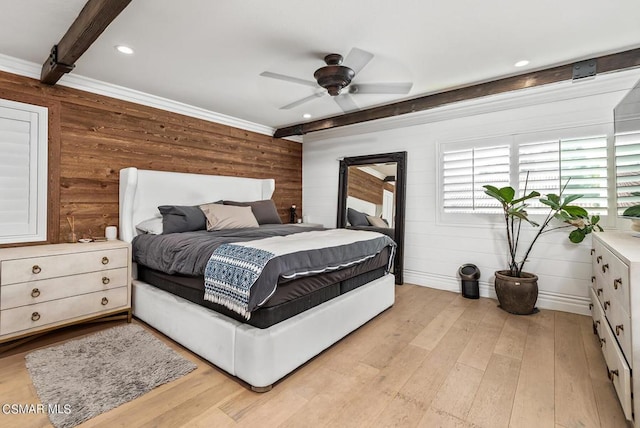 bedroom with ceiling fan, ornamental molding, and light hardwood / wood-style flooring