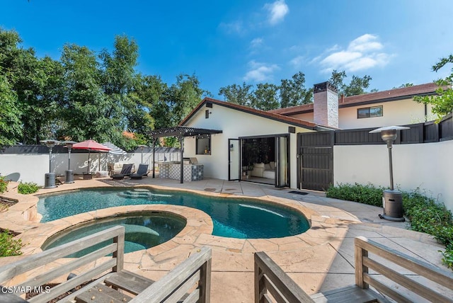 view of swimming pool with an in ground hot tub, a pergola, and a patio