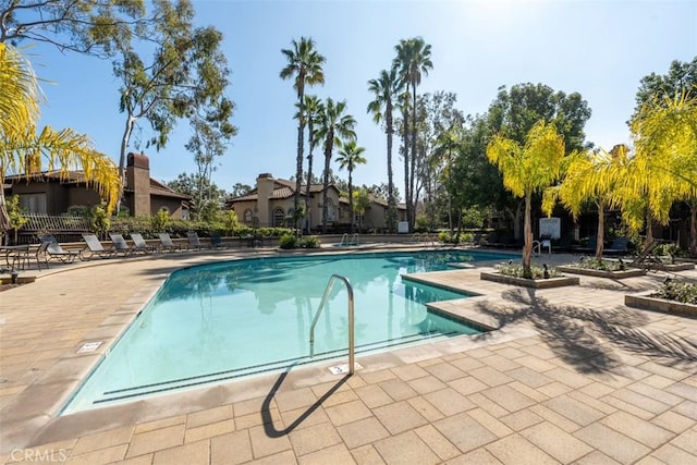 view of pool featuring a patio area