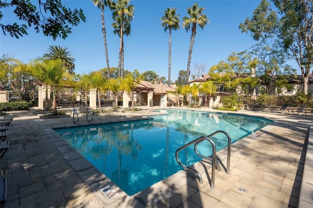 view of swimming pool featuring a patio