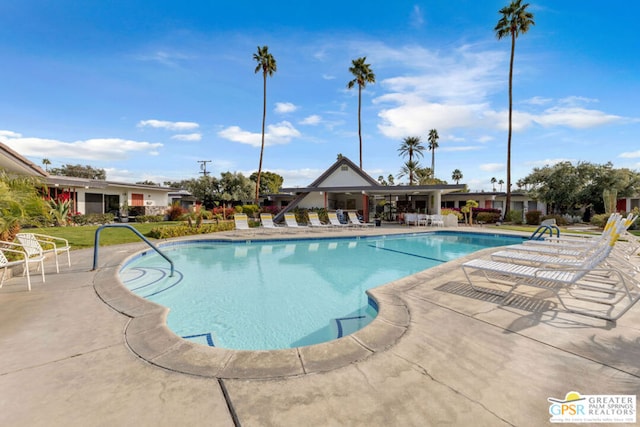 view of pool featuring a patio area