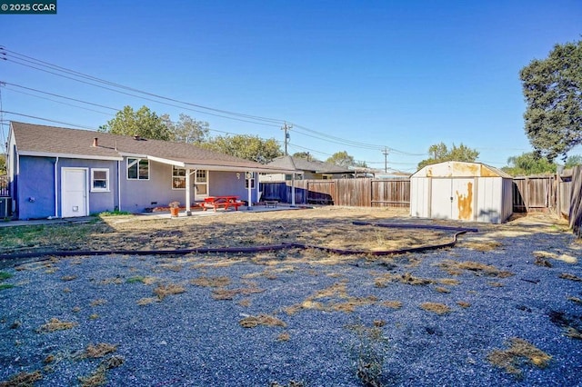 exterior space featuring a storage unit