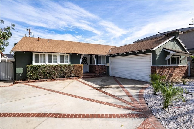 ranch-style house featuring a garage