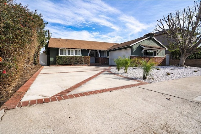 ranch-style house featuring a garage