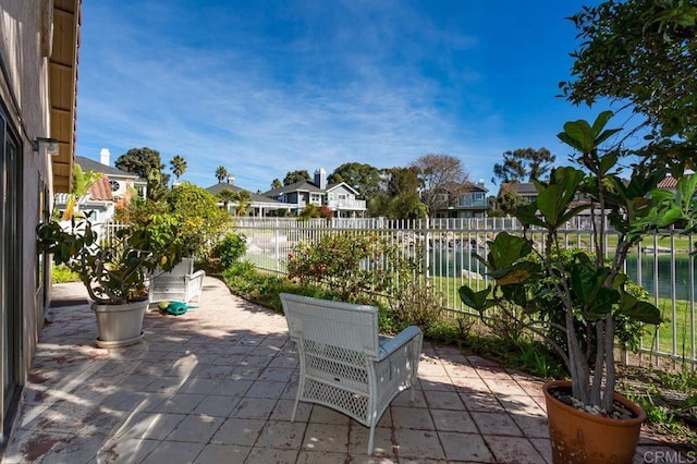 view of patio / terrace with a water view