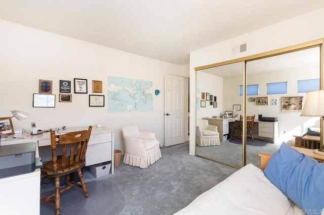 carpeted bedroom with a closet