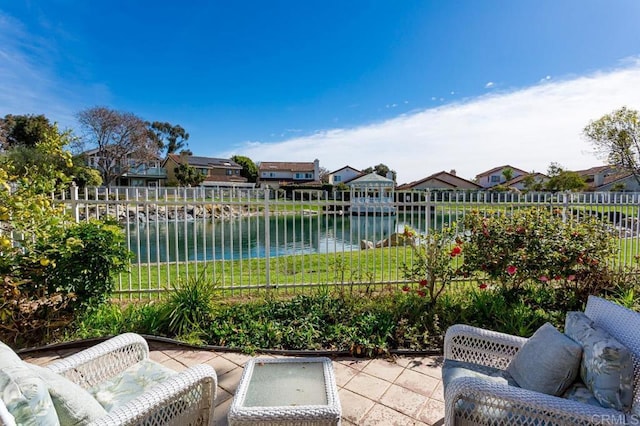 view of patio / terrace featuring a water view