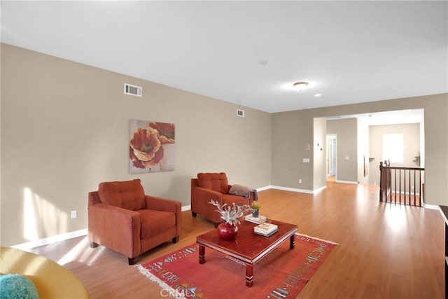 living room with light hardwood / wood-style floors