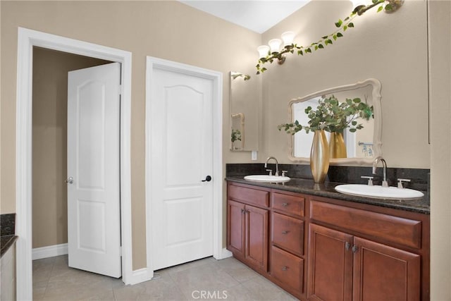 bathroom featuring vanity and tile patterned floors