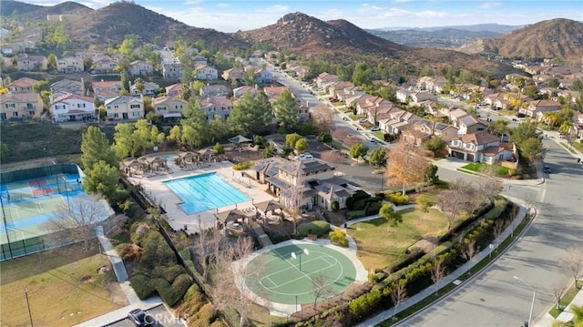 drone / aerial view featuring a mountain view