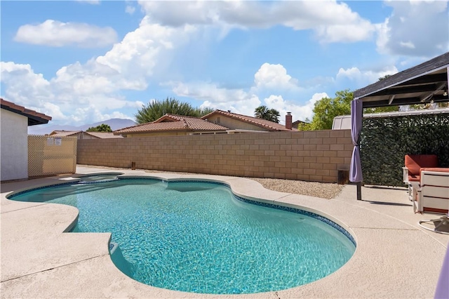 view of pool featuring a patio area