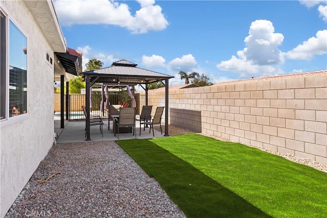 view of yard with a gazebo and a patio area