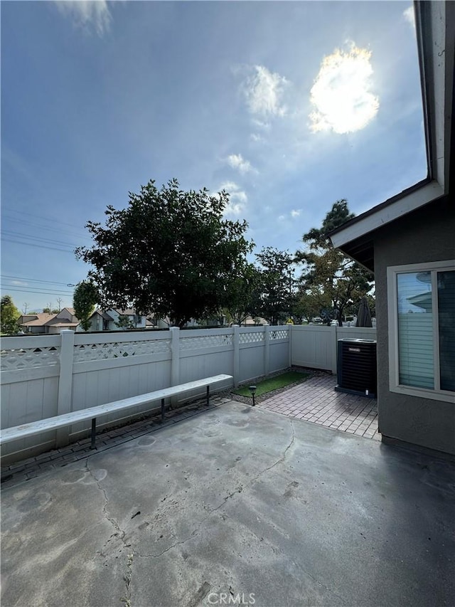 view of patio with cooling unit