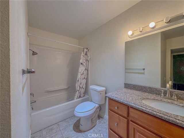 full bathroom with toilet, tile patterned floors, shower / bathtub combination with curtain, and vanity