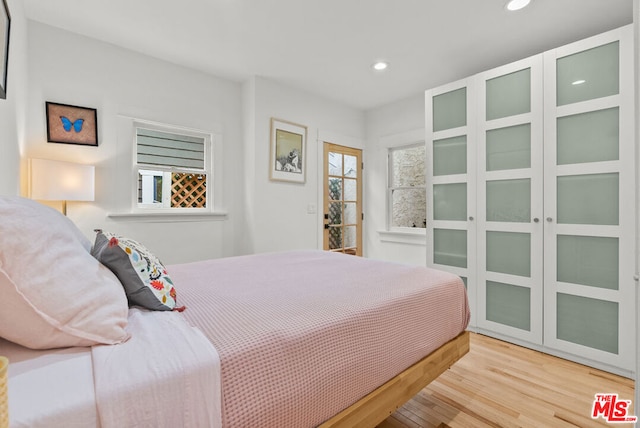 bedroom featuring hardwood / wood-style flooring