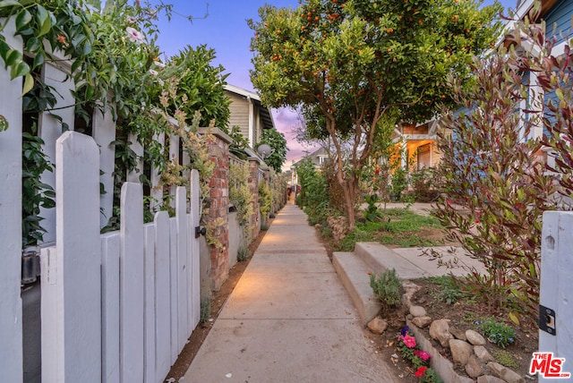 view of property exterior at dusk