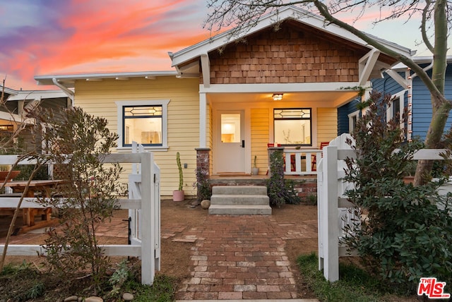 craftsman inspired home with covered porch