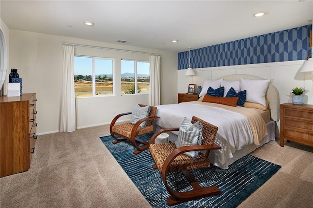 bedroom with light colored carpet