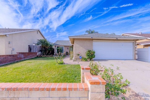 view of front of house featuring a garage and a front yard