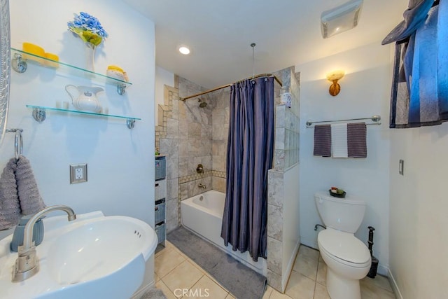 full bathroom featuring tile patterned flooring, sink, shower / tub combo with curtain, and toilet