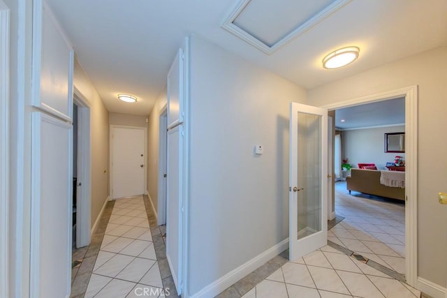 hallway with light tile patterned floors