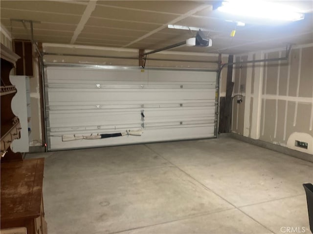 garage featuring a garage door opener