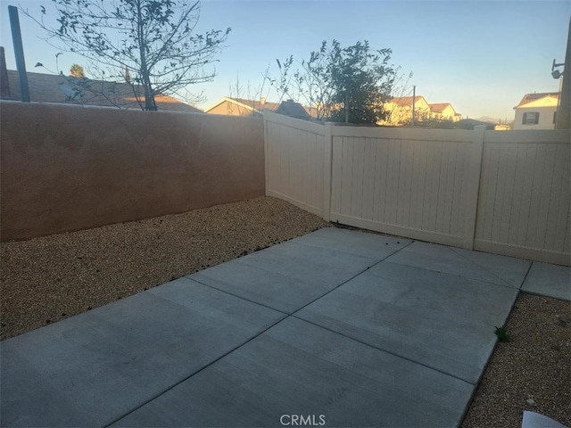 view of patio terrace at dusk