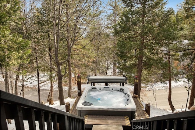 exterior space featuring area for grilling and a hot tub