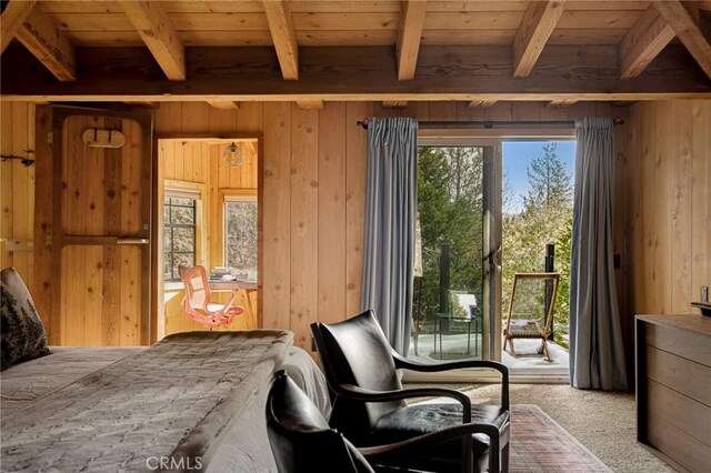 carpeted bedroom featuring beamed ceiling, wood ceiling, access to outside, and wood walls