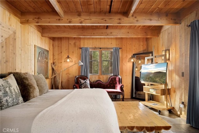 bedroom with wooden walls, beam ceiling, and wooden ceiling