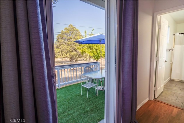 doorway to outside featuring hardwood / wood-style floors