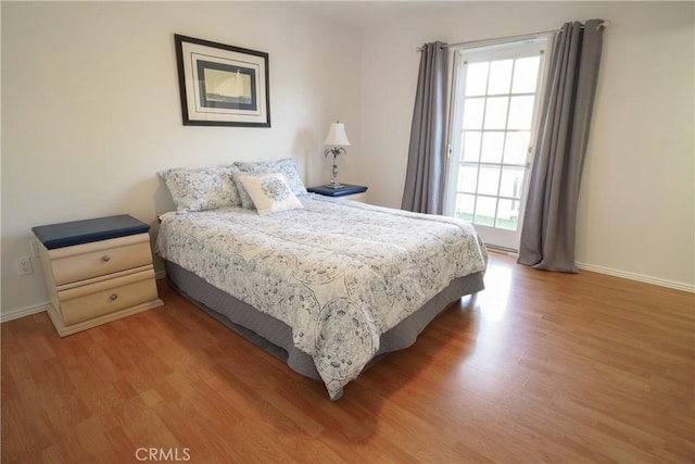 bedroom featuring light hardwood / wood-style floors