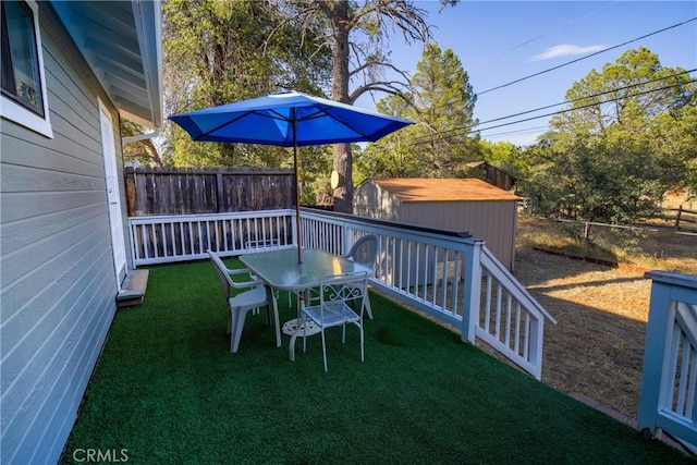 exterior space with a shed