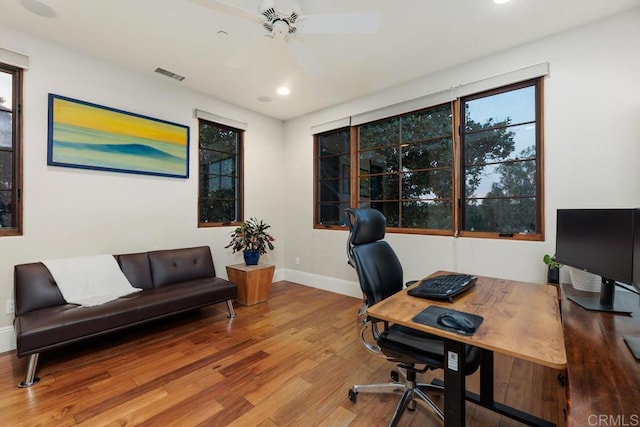 office area featuring wood-type flooring and ceiling fan