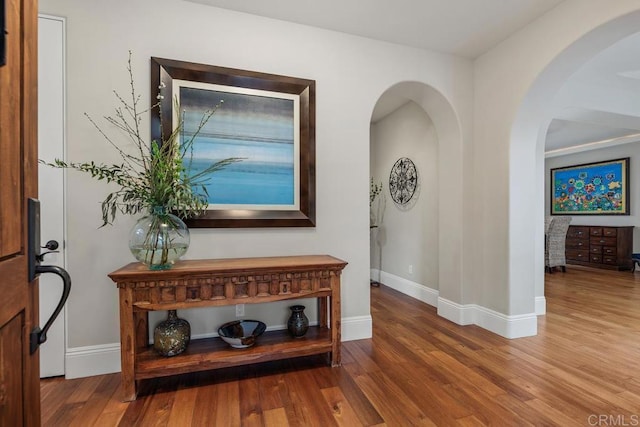 corridor featuring hardwood / wood-style flooring