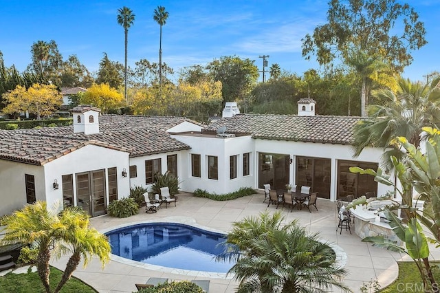 rear view of house featuring a patio area