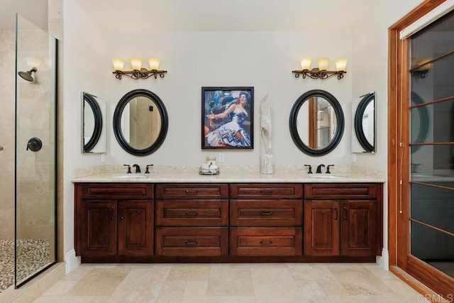 bathroom featuring walk in shower and vanity