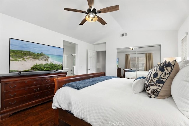 bedroom featuring vaulted ceiling, ceiling fan, hardwood / wood-style floors, and multiple windows