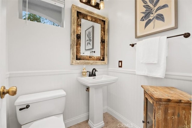 bathroom featuring sink and toilet