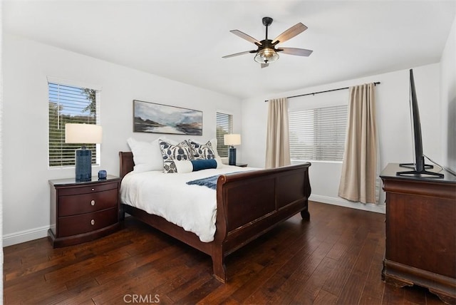 bedroom featuring dark wood-type flooring and ceiling fan