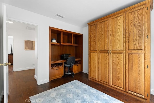 interior space with dark wood-type flooring