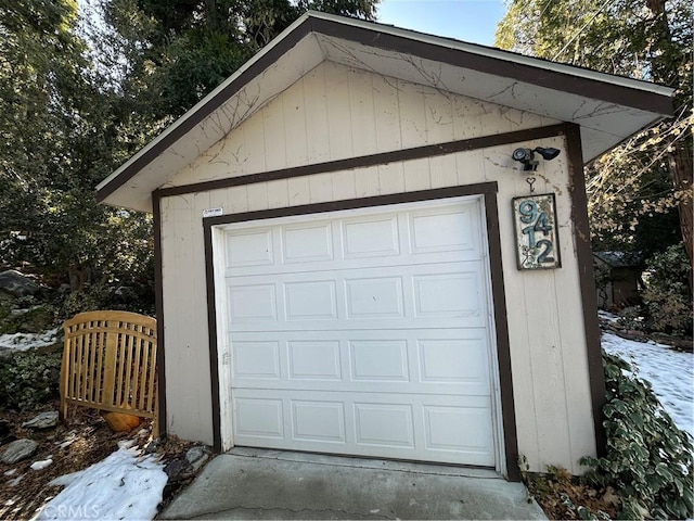 view of snow covered garage