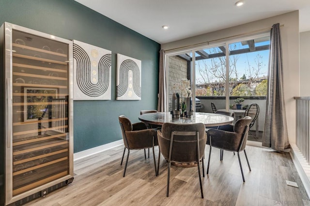 dining space featuring light hardwood / wood-style flooring