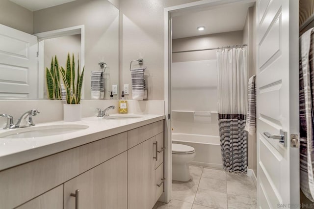 full bathroom with vanity, shower / bath combo, tile patterned floors, and toilet