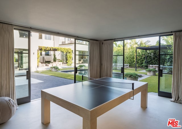 recreation room featuring expansive windows