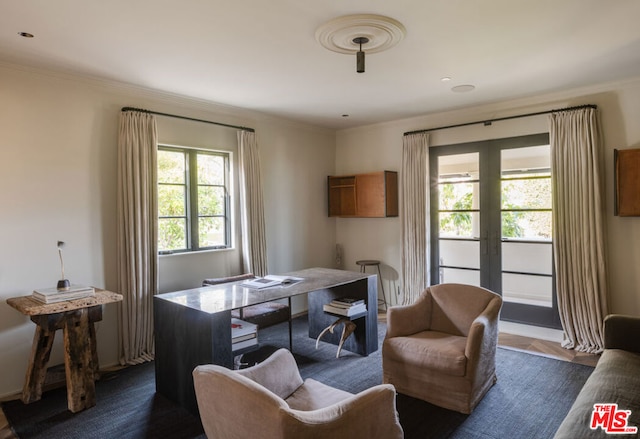 home office featuring crown molding and french doors