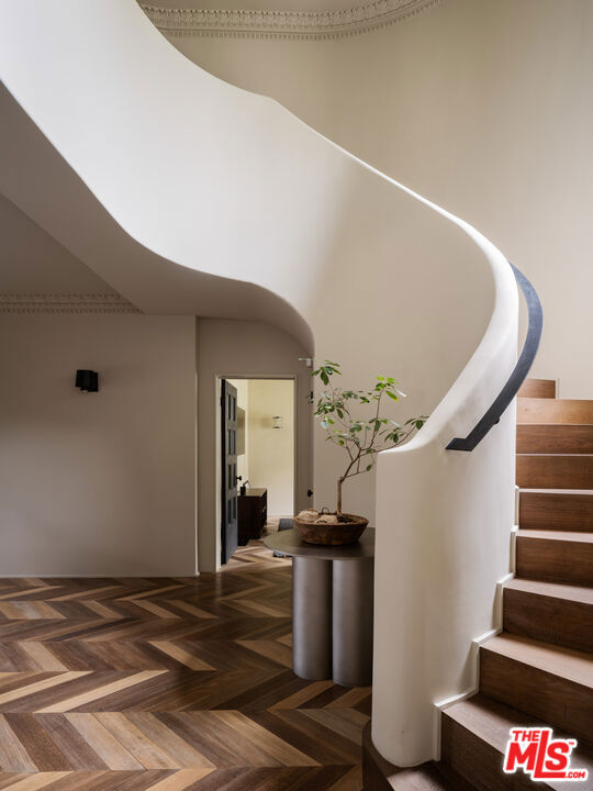 stairway with parquet flooring