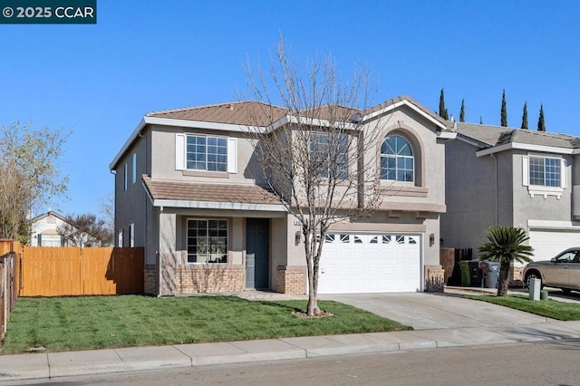 view of front property featuring a garage and a front lawn