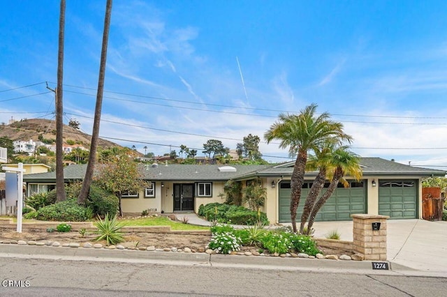 single story home with a garage